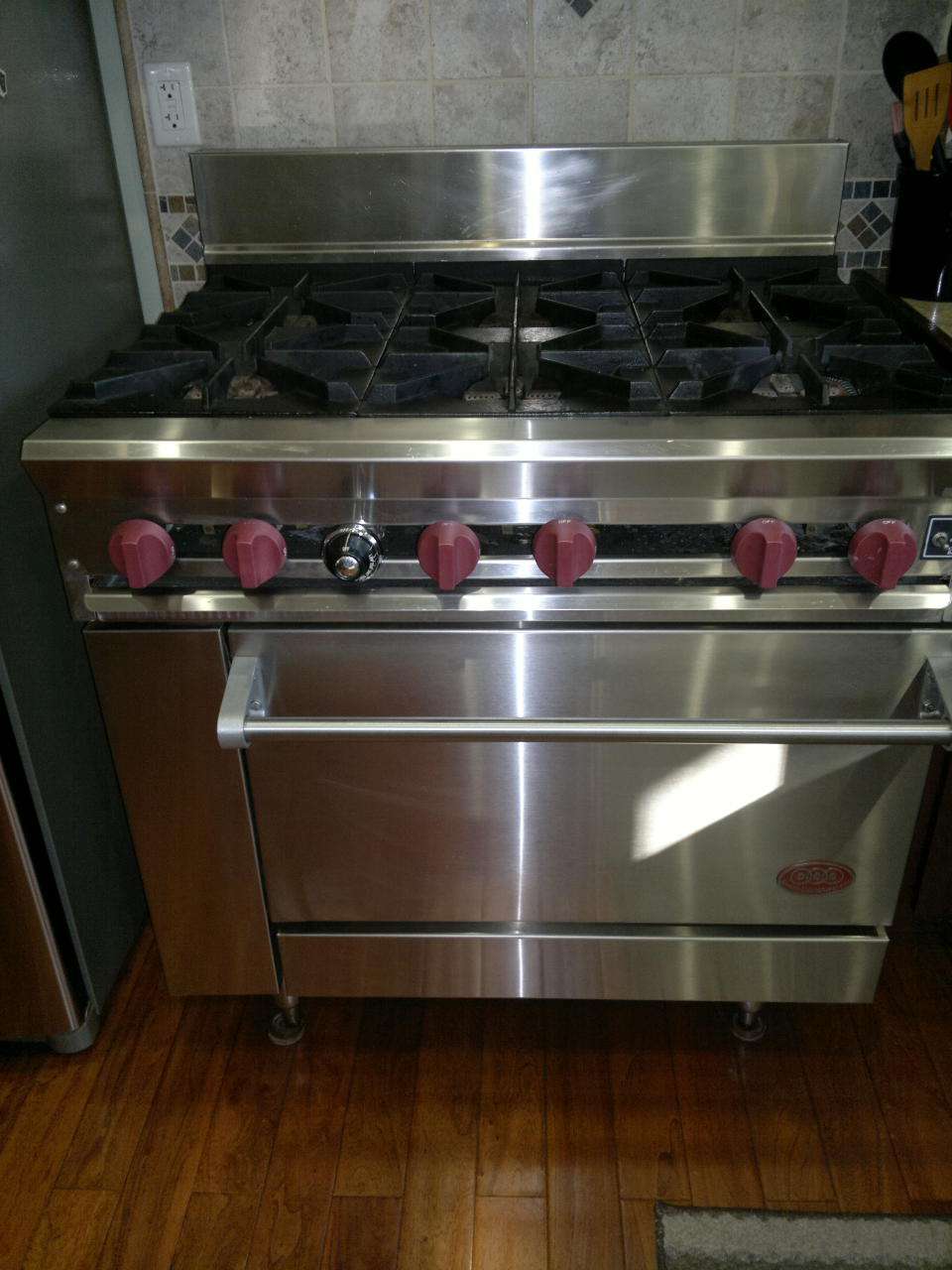 1. 6 burners, 1 each ~30 inch oven.