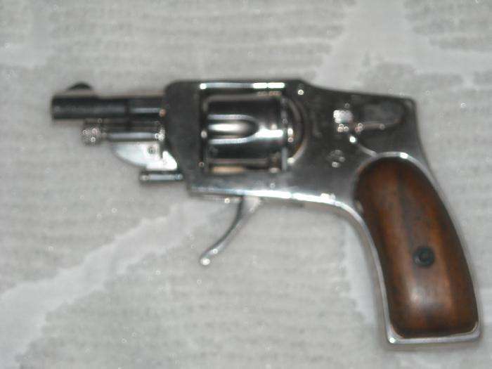 folding trigger .25 acp revolver.