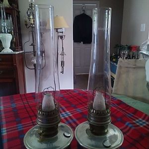 Pair of Aladdin 23 lamps with R910 chimneys, burned in mantles and fuel. $40
