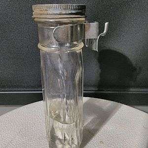 Torch bottle peg board hooks