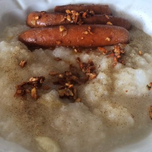 Jook zipped up with sausage and garlic sautéed in butter