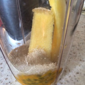 Getting ready to blend pineapple, lilikoi and sugar in the nutribullet to make ice cream.